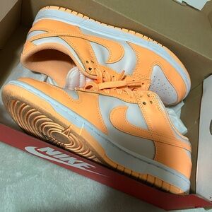 Nike Bright Orange and nude dunks